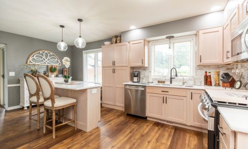 kitchen designed by Doors and Drawers Inc. featured in Small Business Showcase Magazine